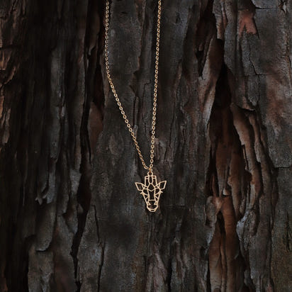 collier girafe or arbre